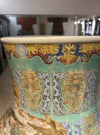 A fine Chinese turquoise-ground famille rose 'Shou' vase with immortals, Qianlong